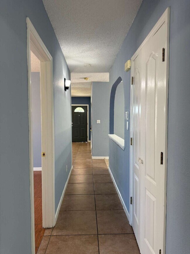 Building Photo - Well, kept three-bedroom, two baths home with Solar Panels. A must see, lease today! 11797 Imperi...