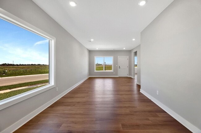 Building Photo - Modern 3-Bed Ranch in Maize – Zero-Entry L...
