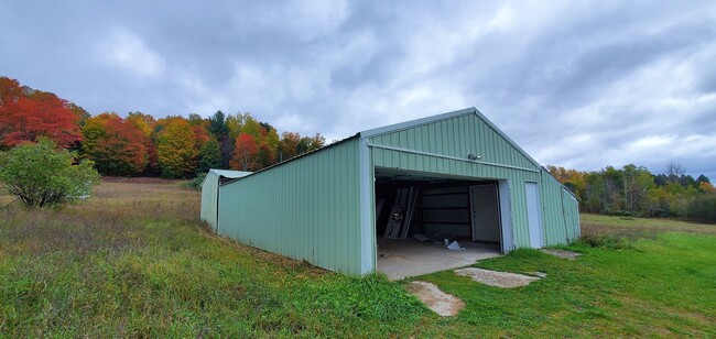 Building Photo - Renovated Farmhouse, 30+ Acres with Pole B...