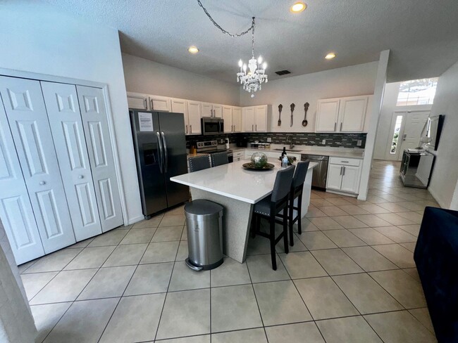 Building Photo - STUNNING Emerald Island Resort 5 bedroom 4...