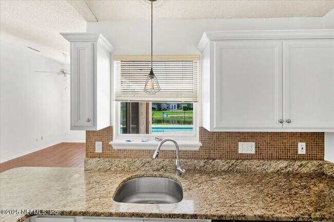 Building Photo - 10334 Triple Crown Ave