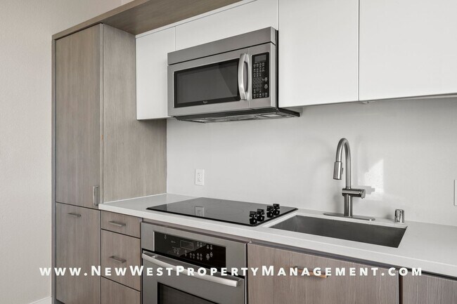 Building Photo - Views, Views, Views! Stunning Top-Floor Little Italy 2-bedroom Loft at The Waterfront!