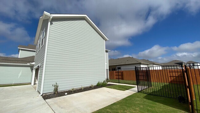Parking pad (Outside) near the entry way. Garage is not included. - 8004 Corrigan Pass