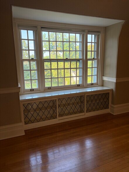 Room one with large window overlooking front lawn - 7709 Cherokee St
