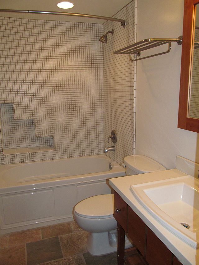 Building Photo - THE BEACH IS YOUR BACKYARD! Light & Bright...