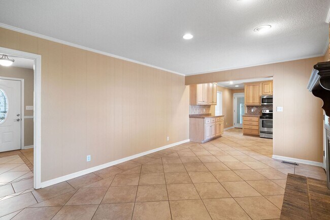 Building Photo - Move-In Special Available! Charming 3-Bedroom Home for Rent in Sango – Spacious Corner Lot