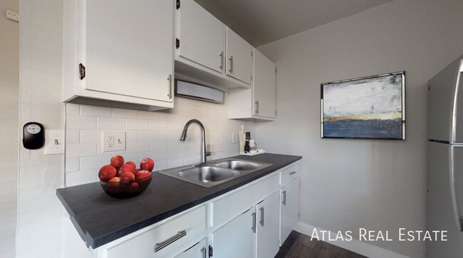 Building Photo - 7155-103 N Raleigh Street-103