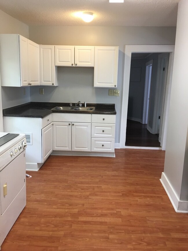 Building Photo - Your Own Home and Yard Centrally Located 3...