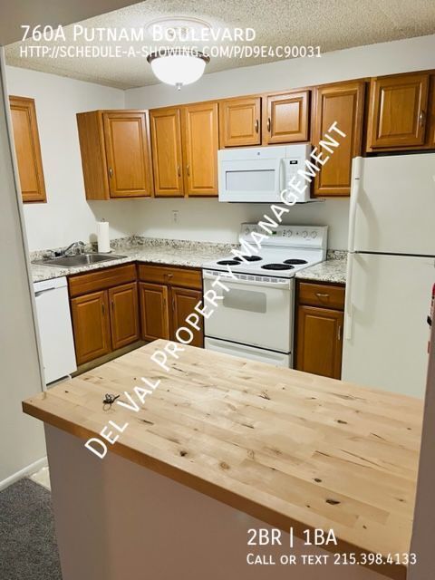 Building Photo - Renovated 2-Bedroom, 1 Bathroom 1st FL Con...