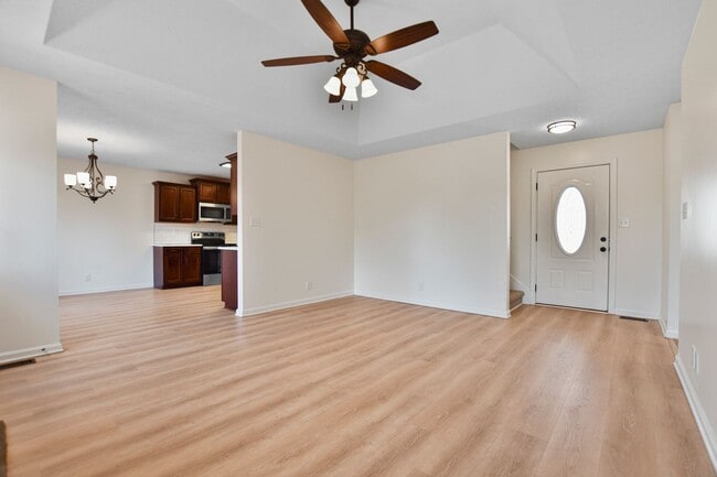 Building Photo - Pet Friendly Three Bedroom with Bonus!