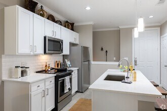 Building Photo - Designer Finishes. Resort-Style Amenities.