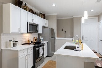 Building Photo - Designer Finishes. Resort-Style Amenities.