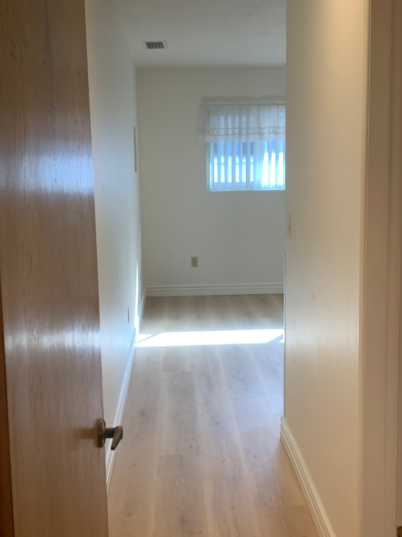 HALL WAY TO PRIMARY BEDROOM - 8322 Mango Ave