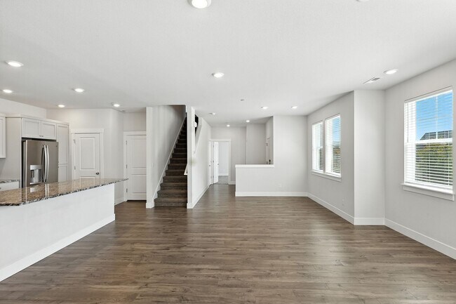 Building Photo - Spacious 4-Bedroom Home, Plus Den/Office with Modern Upgrades and Great Amenities