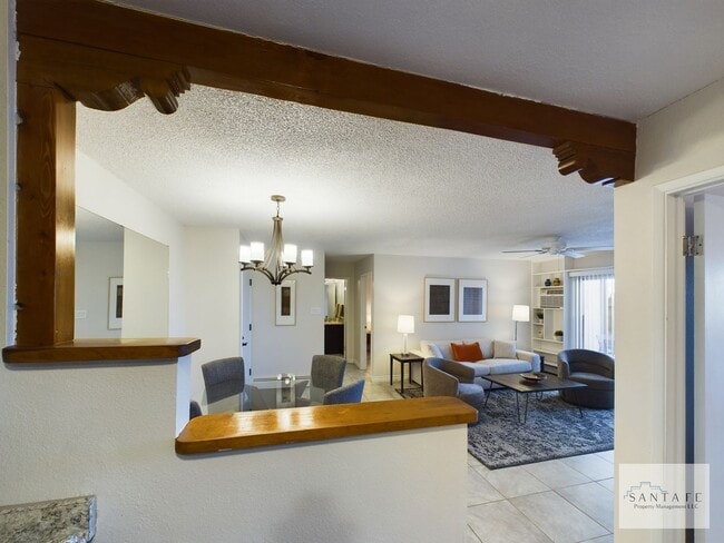 Building Photo - Gorgeous Ground Level Condo at Los Arroyos across from Hospital