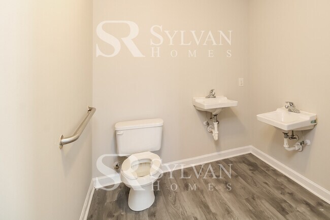 Building Photo - The living is easy in this 3 bedroom, 2.5 bathroom home