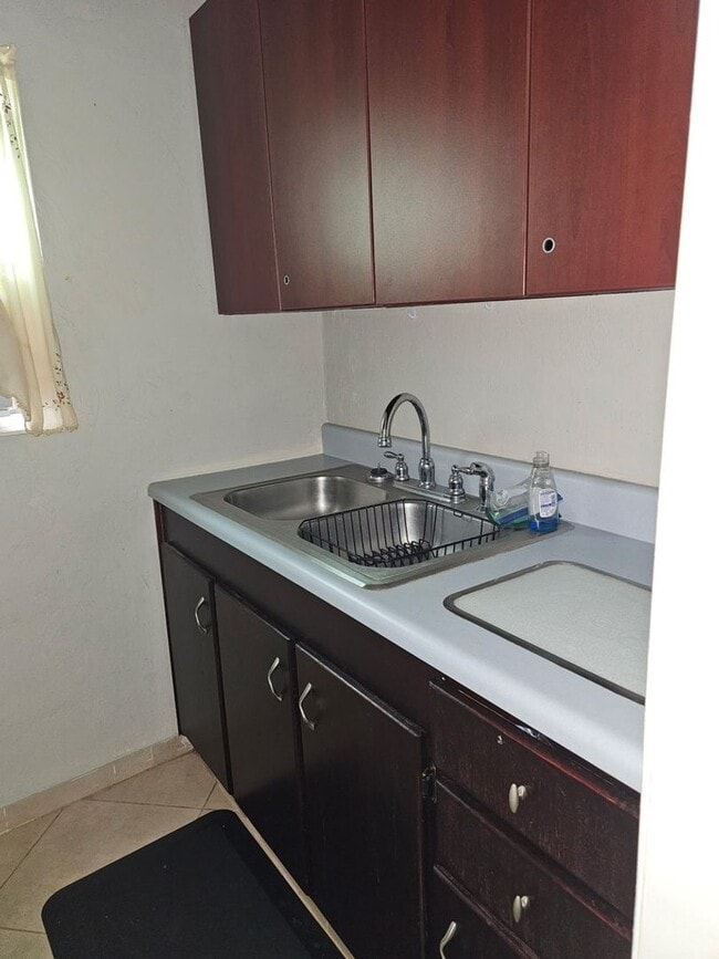 Building Photo - Furnished Studio with Carport & Storage - ...