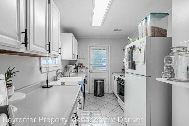 Building Photo - 3 br, 1 bath House - 7309 W 60th Ave