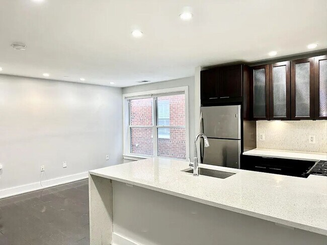 Building Photo - Sleek One-Bedroom in Eastern Market - Parking Spot Included!