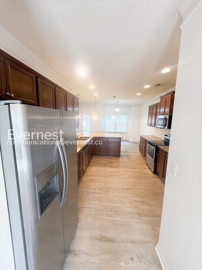 Building Photo - Spacious Home with Fenced Yard & Garage Access / 4 Bed & 3.5 Bath / Voucher Accepted / Pet-friend...