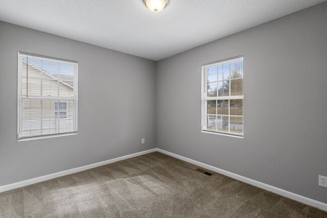 Building Photo - SW - Like New Home! Newer SS Appliances & Cabinets, Ceiling Fans, Blinds, Front Porch and Deck. M...