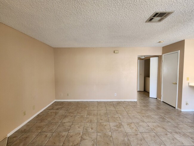 Building Photo - Affordable Condo, Perfect Living Space, Ex...