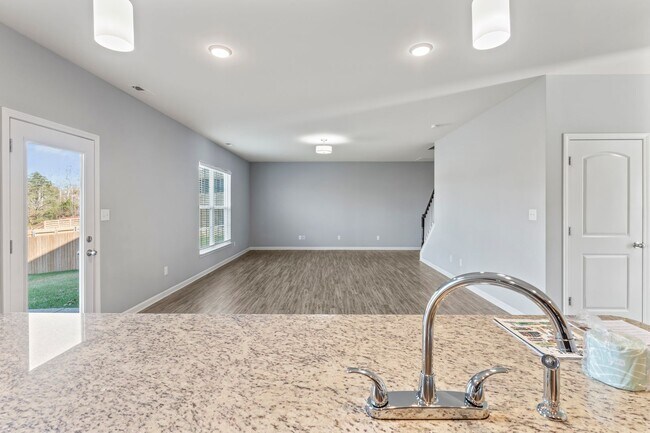 Building Photo - Stunning 4-Bedroom Home with Serene Pond Views