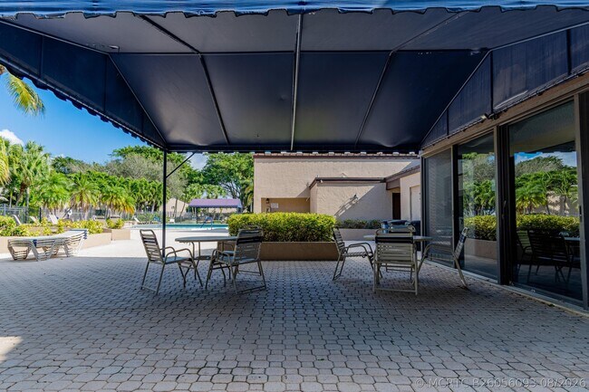 Building Photo - 8689 Boca Glades Blvd W