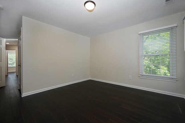 Building Photo - Spacious Bright and Beautiful End Unit Tow...