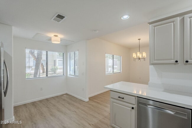 Building Photo - 9455 E Raintree Dr