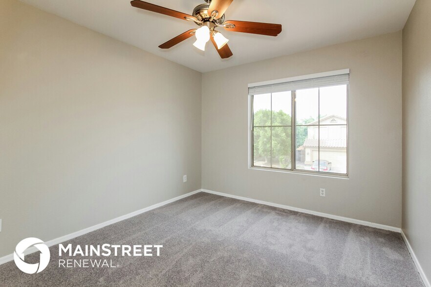 Building Photo - 7013 W Aire Libre Ave