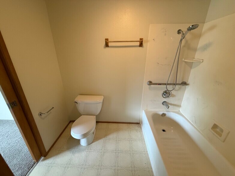 Upstairs full bath, door to master room - 329 Bessie St