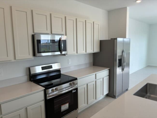 Building Photo - BRAND NEW 3 bedroom 2.5 bath with 2 car ga...