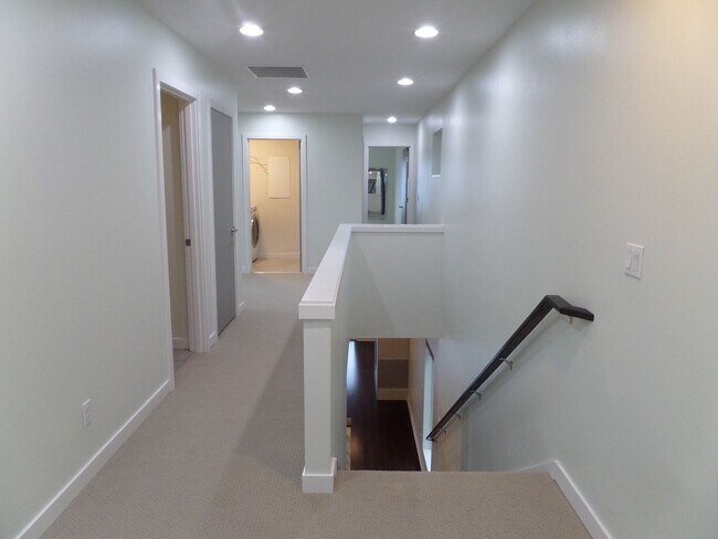 Building Photo - Immaculate and LARGE 4-Bedroom Home in Unb...