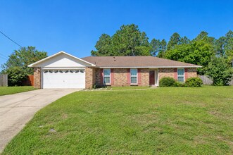 Building Photo - SW Pensacola Creek-Front Home with Screened Porch!