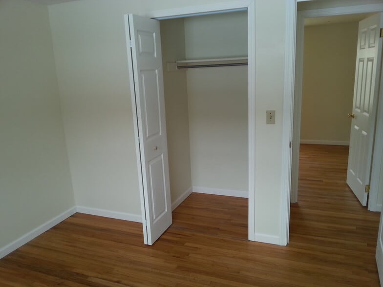 Rear 2nd floor bedroom closet with view into front bedroom - 224 S Sage Cir