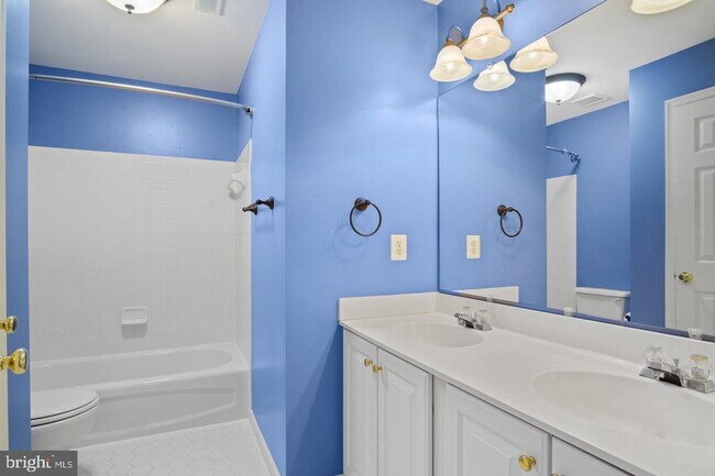 Building Photo - Spacious 4-Bedroom Home with Lake Views & Finished Basement