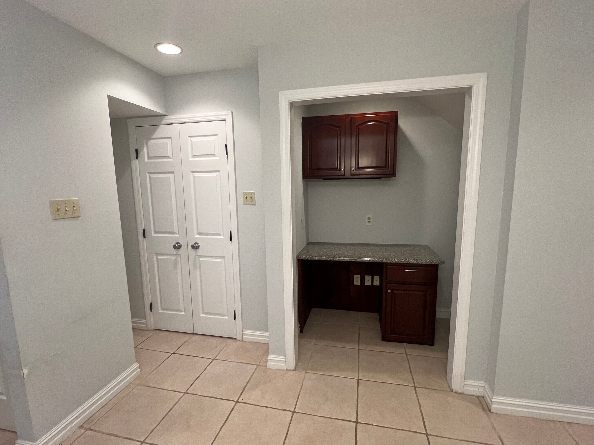 Downstairs storage closet, and desk off of the living room - 6803 Louisville St