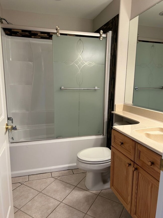 Building Photo - Long term - unfurnished ground floor condo