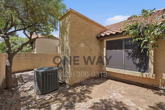 Building Photo - 5704 E Aire Libre Ave