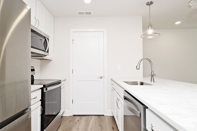 Building Photo - Dog-Friendly End-Unit Apartment