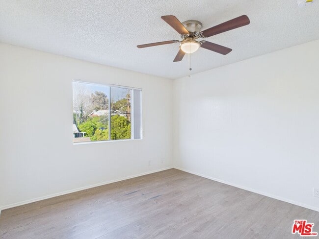 Building Photo - 236 S Ave 55