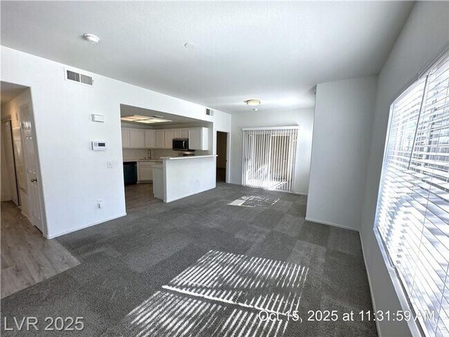 Building Photo - SPACIOUS FIRST-FLOOR CONDO LOCATED IN A GATED COMMUNITY!