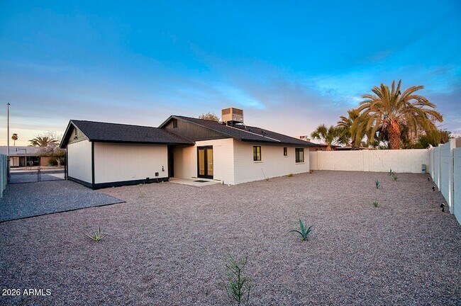 Building Photo - 8015 W Roma Ave