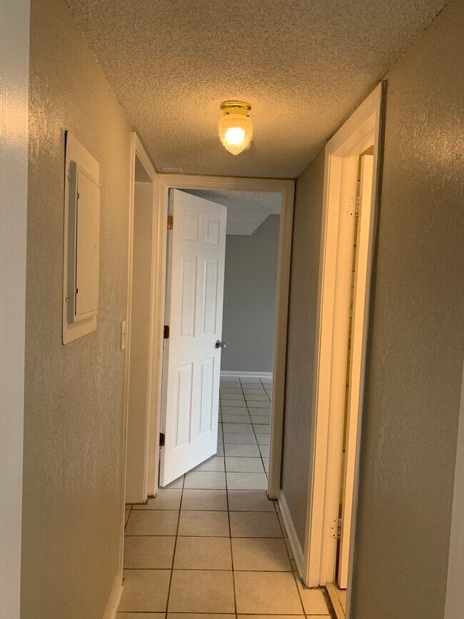 hall looking into bedroom #2 - 3877 Herschel St