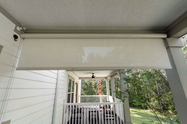 Building Photo - Introducing a captivating 3-story townhome...