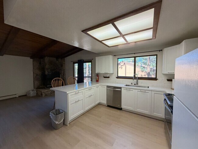 Building Photo - Tri-Level Lake Village Condo with Upgrades