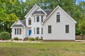 Building Photo - 5BR/3BA with Fresh Paint and New Carpet in...