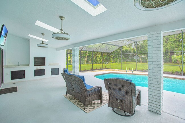 Building Photo - Beautifully Updated 3/2 Pool Home with Large Backyard in Lake Ajay (Gated Community)