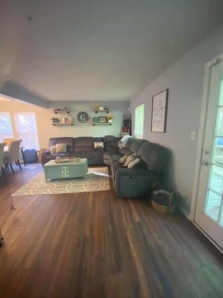 Living room with furniture - 7812 Foxfarm Ln